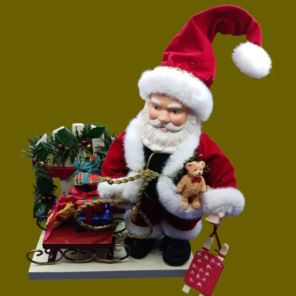 Santa figurine with sleigh and toys